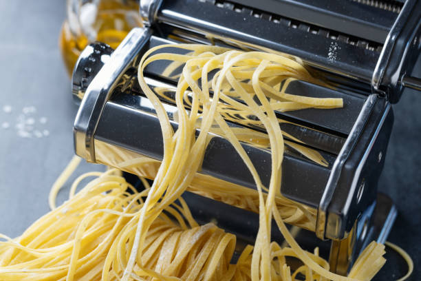 istock Homemade pasta on dark background 1411881999