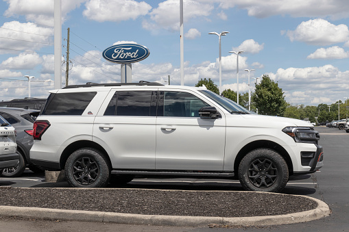 Plainfield - Circa July 2022: Ford Expedition display at a dealership. Ford offers the Expedition in XL, XLT, Limited and Platinum models.