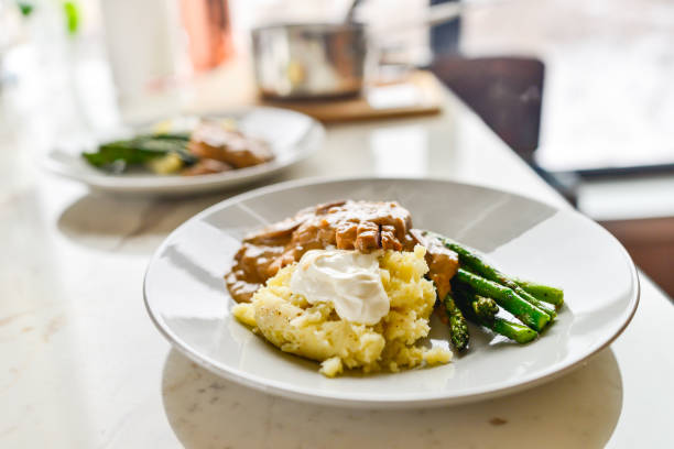 Meat and Potatoes - Plated Potatoes, Asparagus and Pork Chops