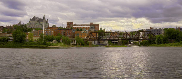 Sherbrooke city downtown river landscape Estrie Quebec Canada panoramic cityscape sunset Sherbrooke river city downtown landscape Quebec Canada panoramic riverside Eastern Townships tourism destination sherbrooke quebec stock pictures, royalty-free photos & images