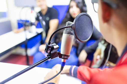 Using microphone in radio studio