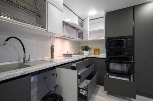 istock Modern simple trendy dark grey and white kitchen 1411890275