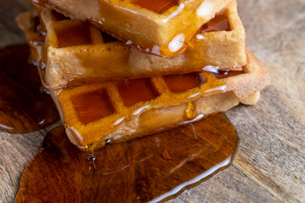 istock soft waffles with natural bee honey on a serving board 1411892033