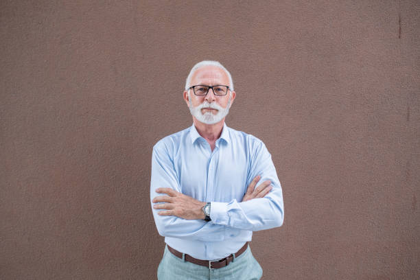 istock Happy senior businessman 1411897924