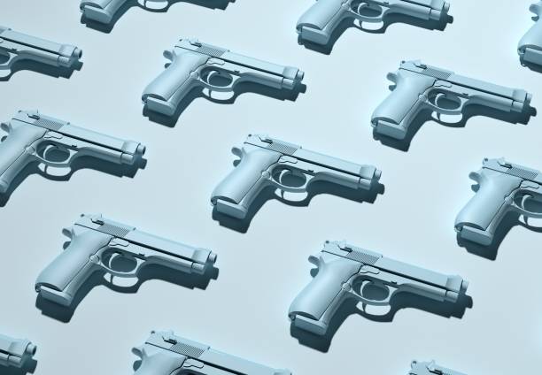 Gun Violence, gun control, weapon, handguns stock photo