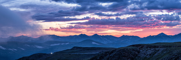 Pinks and purples in the clouds at sunset over the Never Summer Mountains as seen from Trail Ridge Road in Rocky Mountain National Park, Colorado