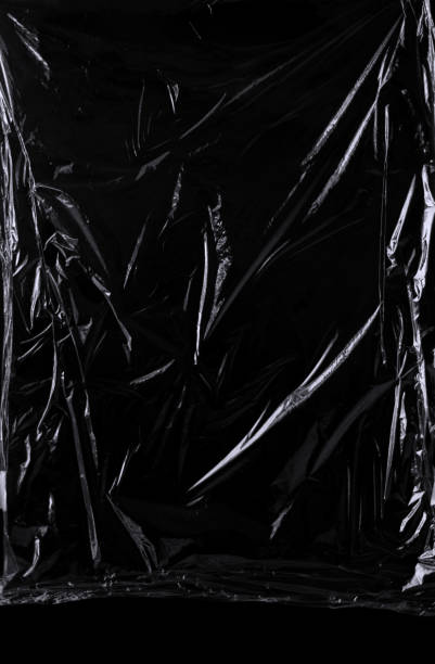 istock Black transparent plastic wrap texture overlay background. Realistic plastic for poster design and photo overlay effect. Wrinkled plastic surface pattern for graphic design sources and element. 1411916190
