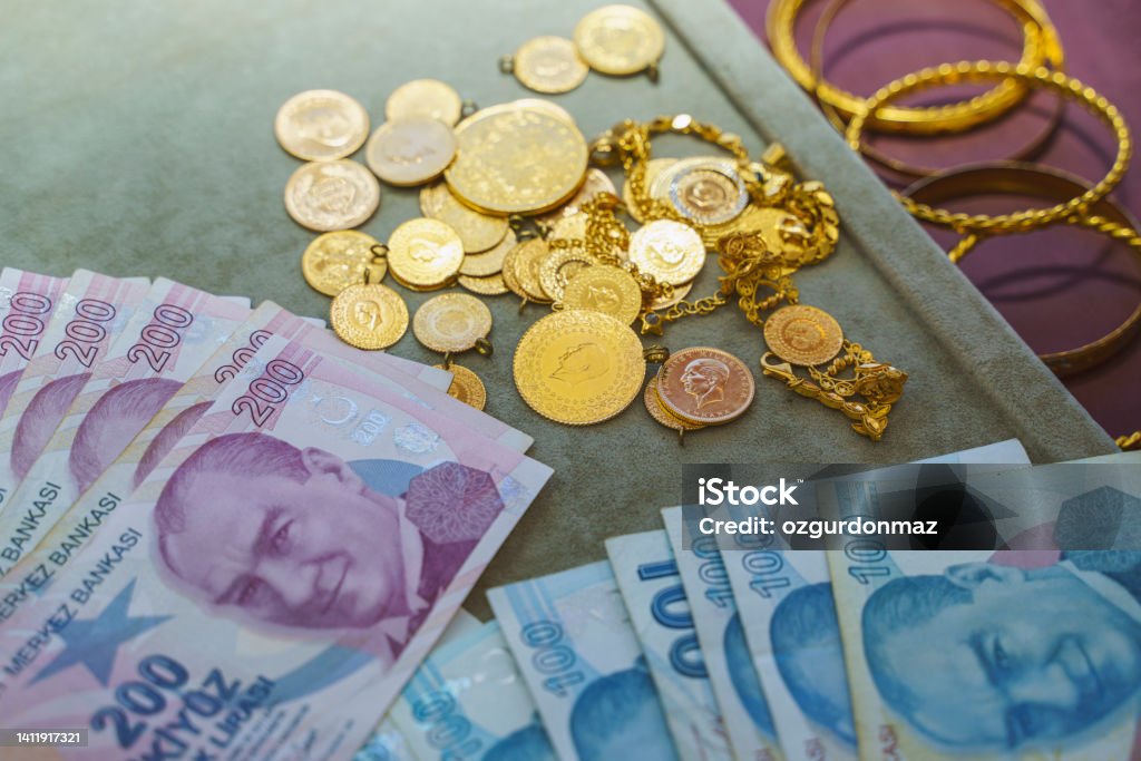 Large group of Turkish Gold coins with Turkish Lira Banknotes Gold - Metal Stock Photo