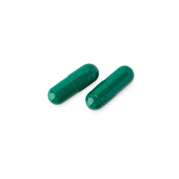 istock Medical pill capsule isolated on white background with clipping path 1411922790