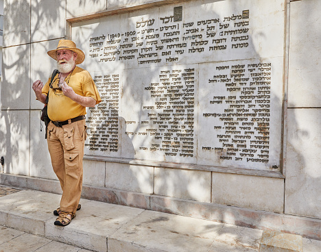Tel Aviv, Israel - May 27, 2022: From this memorial stone began the Foundation of the city of Tel Aviv, First Street in Tel Aviv on Rothschild Boulevard.