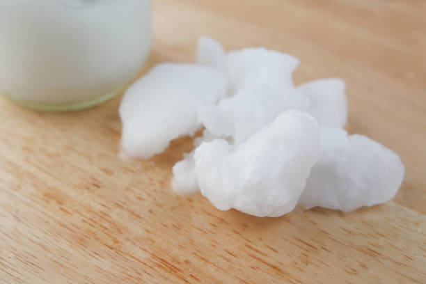 istock cold oil coconut on a wooden board 1411925168