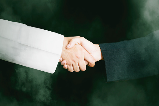 Business agreement with handshake