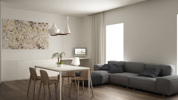 istock Minimalist living room, interior design, home working space, modern gray sofa, dining table with wooden chair, parquet flooring, luxury pendant lamps, architect designer concept 1411935459