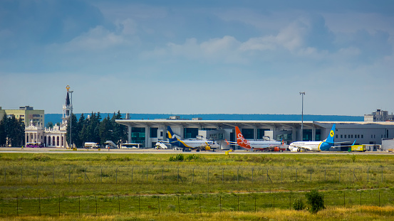 Ukraine , Kharkiv, June 31, 2022, Airport near the city, planes landing at Kharkiv airport, beautiful view of the lifting plane