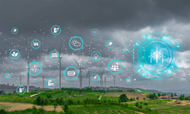 istock Environmental technology concept. development goals of renewable energy,Icon virtual screen wind turbines generate electricity and  Wind turbines generate electricity in a rural location in background 1411940188
