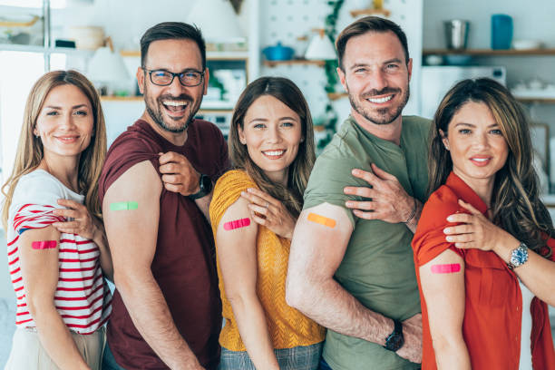 istock Friends showing their arms after getting vaccinated 1411940840