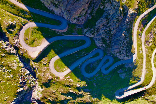 Aerial view of old Tremola road at Swiss pass named St. Gotthard between canton Uri and canton Ticino at the Swiss Alps on a sunny summer day. Photo taken June 25th, 2022, Gotthard Pass, Switzerland. gotthard pass stock pictures, royalty-free photos & images