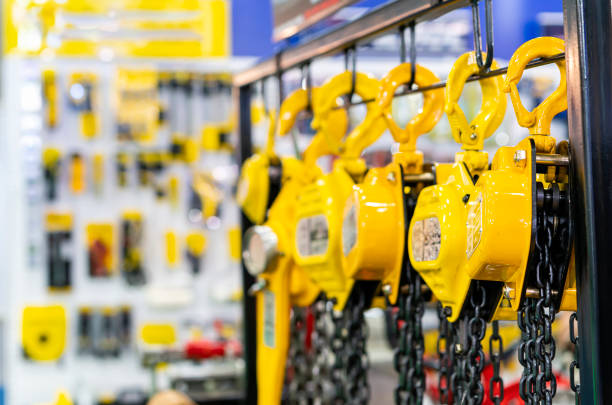Industrial Manual chain hoist equipment labor saving machine for lifting object and reduce work load hang on the line stock photo