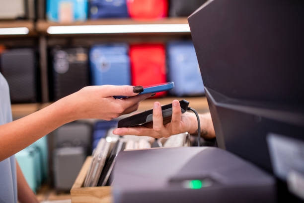 istock Contactless payment with a mobile phone 1411948320