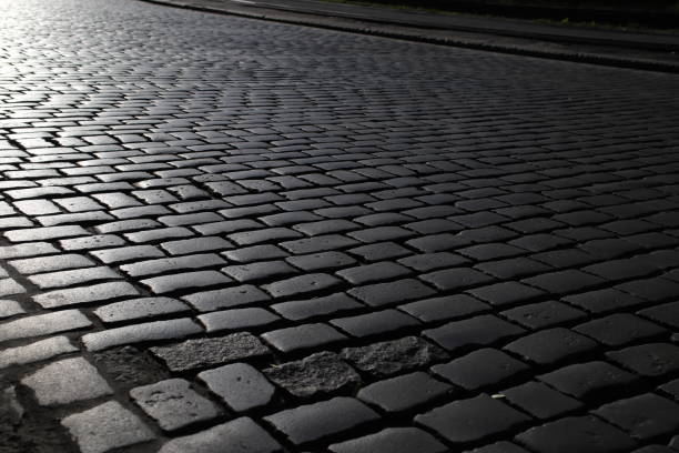 istock old city street lined with stone cobblestones 1411953238