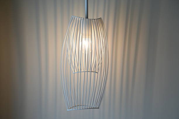 istock luxury lamp hanging on room with white curtain 1411956070