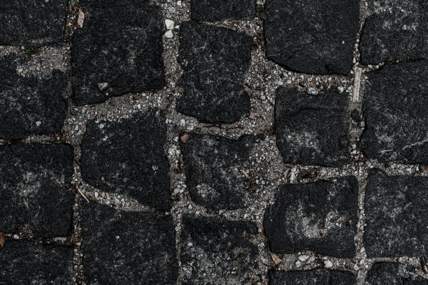 istock Close-up top view of stone block paving texture 1411961552