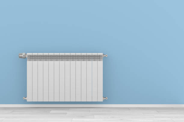 istock Heater thermostat and radiator in empty room. 3D illustration 1411961839