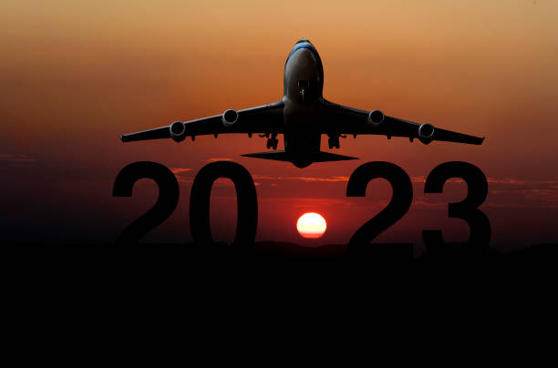 istock New year 2023 concept with passenger plane 1411961848