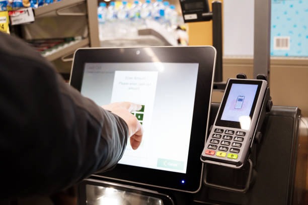 Eftpos Machine at Self Checkout Eftpos Machine at Self Checkout in a supermarket self checkout photos stock pictures, royalty-free photos & images