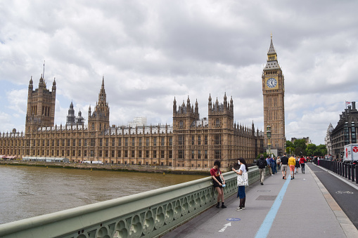 London, UK -  June 10 2022: daytime view of Westminster Bridge,  Houses of Parliament and Big Ben.
