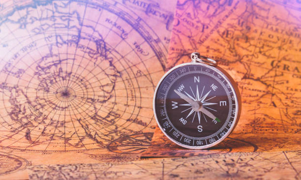 istock Looking for adventure. Compass and maps. Treasure map and path to the treasure. 1411963580