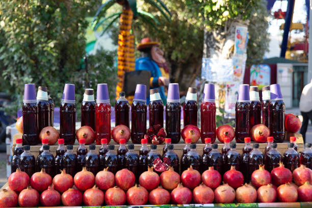 istock Fresh pomegranates on the market. 1411964019