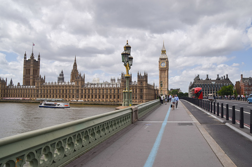 London, UK -  June 10 2022: daytime view of Westminster Bridge,  Houses of Parliament and Big Ben.