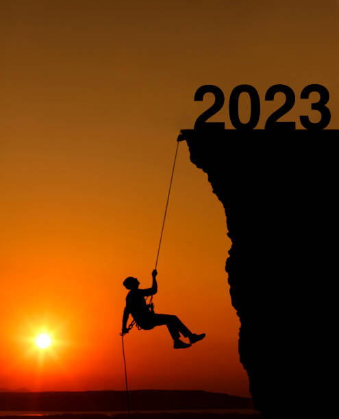 istock Man rock climbing to 2023 1411965674