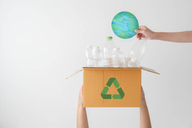 istock People launch a campaign to recycle used empty plastic bottles. 1411965775