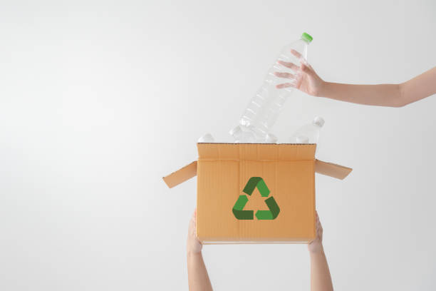 istock People launch a campaign to recycle used empty plastic bottles. 1411965901