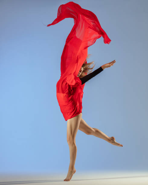 istock Female dancer on gray background 1411969639