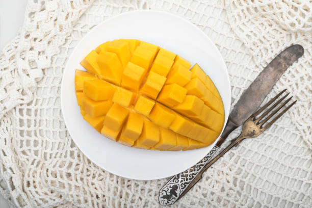 istock Healthy food mango fruit on white table background. 1411971476