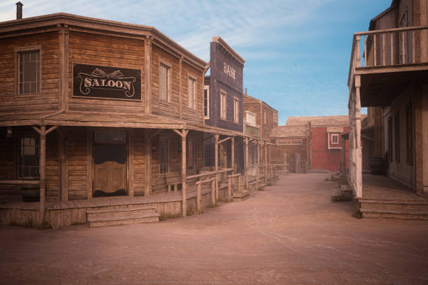 Empty dirt street in an old western town with various wooden buildings. 3D illustration. stock photo