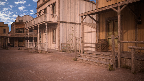 Wooden steps and entrance to house on a old American western street with hotel and saloon in the background. 3D illustration.