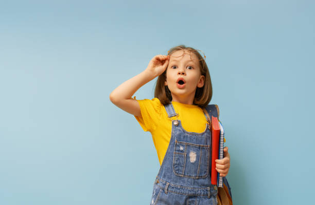 istock girl is ready to back to school 1411978929