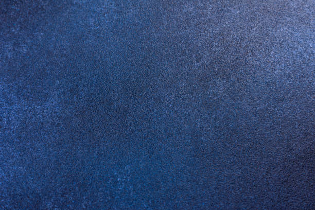 istock Texture of a concrete wall with cracks and scratches which can be used as a background 1411984231