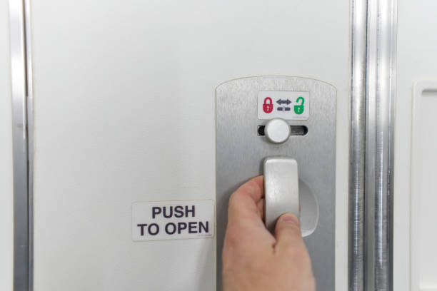 istock Door Lock button for Toilet on the plane 1411990100