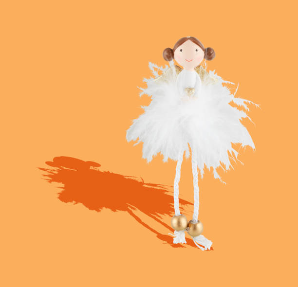 Blonde ballerina with pointe and pink tutu.