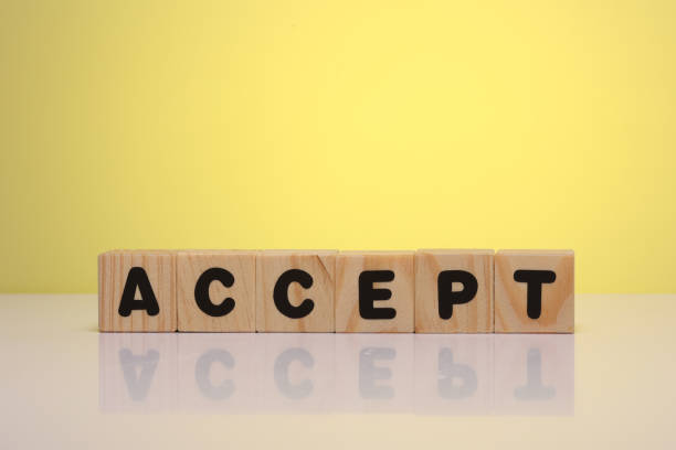 istock ACCEPT word on wooden cubes 1412002459