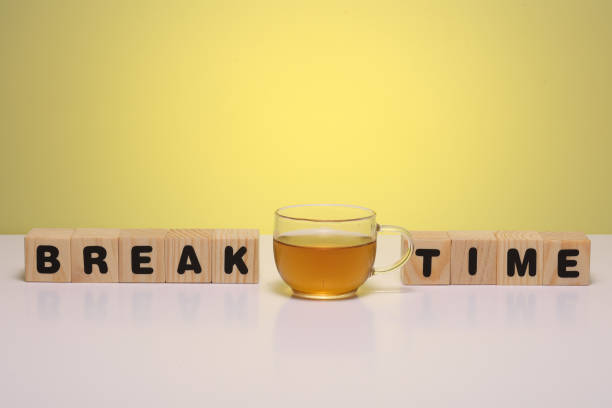 istock BREAK TIME  word on wooden cubes 1412002574