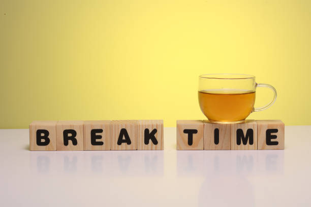 istock BREAK TIME  word on wooden cubes 1412002576