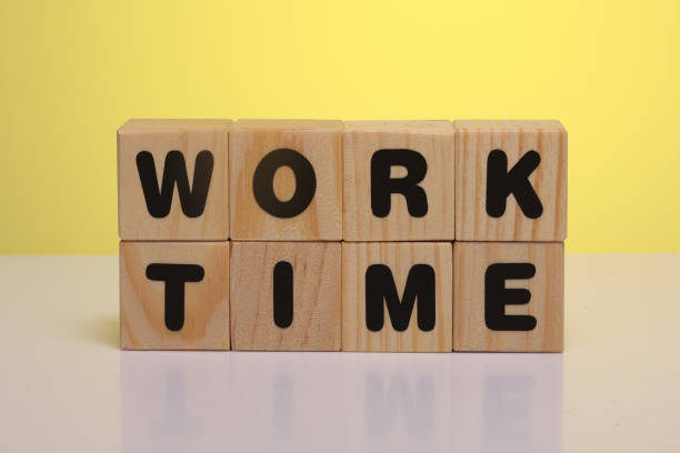 istock WORK TIME word on wooden cubes 1412002866