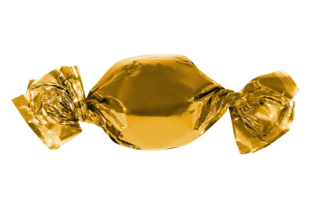 istock Candy in gold foil isolated. 1412005465