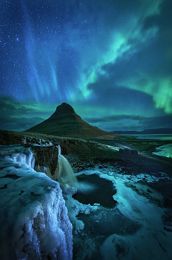 Beautifulls Northern lights over West Iceland in the mount Kirkjufell in snaefellsnes